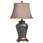 StyleCraft - Magonia Table Lamp, Brown/Antique Gold - This ornate lamp showcases a highly embellished frame with a Brown and Rich Antique Gold finish and a matching finial. A taupe tapered oval softback shade with matching trim shade completes the gorgeous base. An elegant accent for a living room, office, or hallway, this lamp also works well on a dining room buffet or a bedroom nightstand.