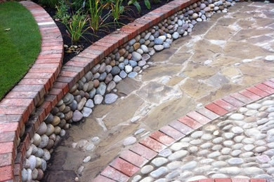 Design ideas for a bohemian back patio in Other.