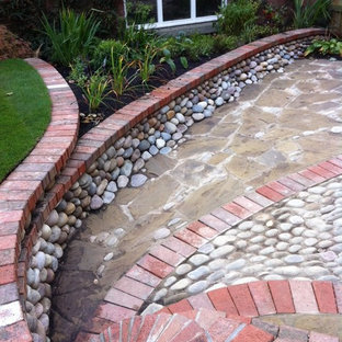 Design ideas for an eclectic backyard patio in Other.