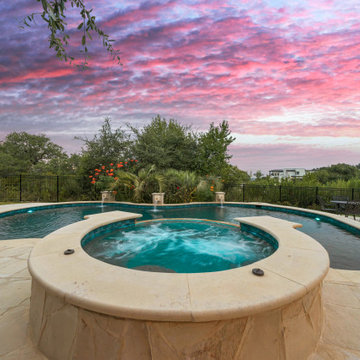 Freeform Pool with Spa and Scuppers in Texas Hill Country
