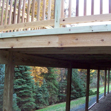 LARGE BASIC PRESSURE TREATED DECK WITH CEDAR INFILL AND BALUSTERS