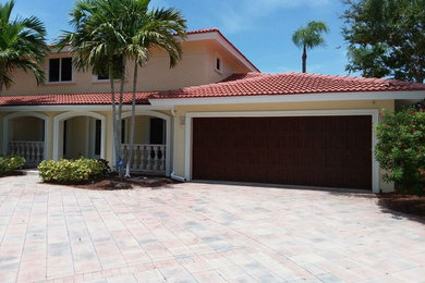Example of a two-story exterior home design in Tampa