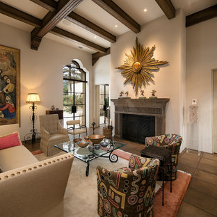 Large mediterranean open plan living room in Santa Barbara with a home bar, beige walls, terracotta flooring, a standard fireplace, a stone fireplace surround and no tv.