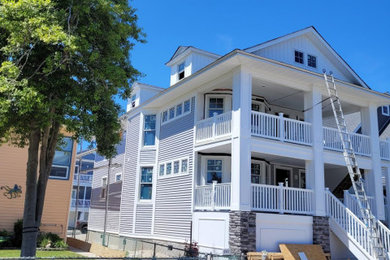 Coastal exterior home idea in Other
