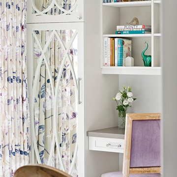 Mirrored Kitchen Cabinetry Reflects the Dining Room