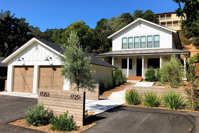 Mid-sized cottage white two-story wood exterior home photo in San Francisco
