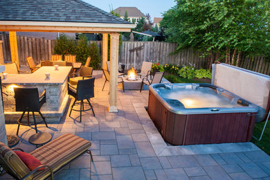 Patio - modern patio idea in Toronto
