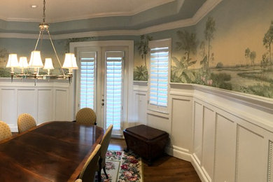 Example of a beach style dining room design in Tampa