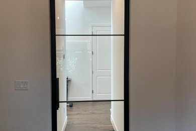 Example of a minimalist home office design in Other