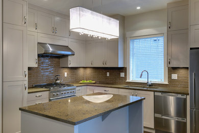 Example of a trendy kitchen design in Vancouver
