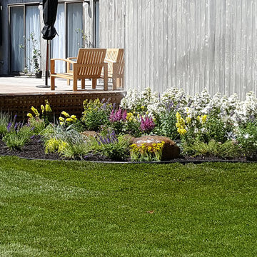 Backyard Makeover Installing Sod, Privacy Hedge, Flower Garden, Gravel Driveway