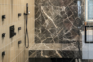Inspiration for a mid-sized modern black tile and porcelain tile porcelain tile, gray floor and double-sink bathroom remodel in Other with flat-panel cabinets, white cabinets, a bidet, beige walls, an integrated sink, solid surface countertops, a hinged shower door, white countertops and a floating vanity