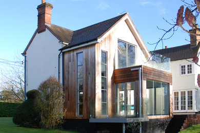 Design ideas for a mid-sized contemporary home design in Berkshire.