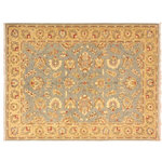 Bareens Designer Rugs - Shabby Chic Ziegler Iraida Gray Gold Hand-Knotted Wool Rug - 4'10'' x 6'11'' - Enhance the ambiance of your home with this magnificent Persian-influenced Turkish hand-knotted rug made by skilled artisans capable of creating the most exceptional vegetable dyes and hand-spun wool. This exquisite handmade rug is a one-of-a-kind Peshawar Kafkaz, otherwise identified as Chobi, Chobi Peshawar, Oushak, or Ziegler rug. These handmade rugs are crafted in Pakistan utilizing superior-quality wool imported from Australia, New Zealand, and Korea in two types of weaves: the Persian weave and the Mori weave. This rug is meticulously crafted by hand using the finest natural vegetable dyes extracted from local plants. The artisans use a blend of hand-spun local and fine merino wool, resulting in a rug with a compelling texture, higher lanolin content, and longer staple. The artisans occasionally incorporate natural or artificial silk into the pile to enhance specific motifs. The finished product is an awe-inspiring execution of flawless design and an understated palette that exudes elegance.