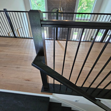 Project #130 | Curved Staircase with Wraparound Balcony