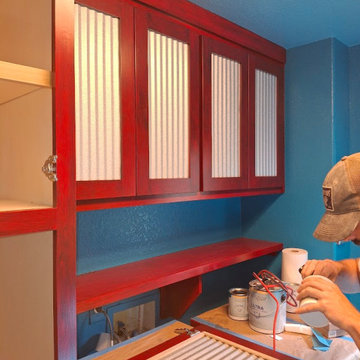 Custom Red Stained Cabinets with Corrugated Metal Door Inserts