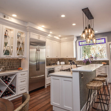 Transitional White Kitchen Remodel | Glass Display Cabinets & Custom Island
