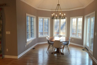 Example of a trendy dining room design in New York
