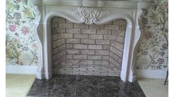 Weathered-Stone faux brick inside fireplace