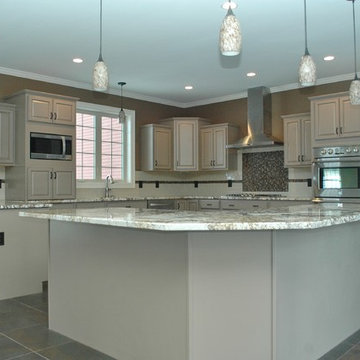 Kitchen with granite counter tops and range stove