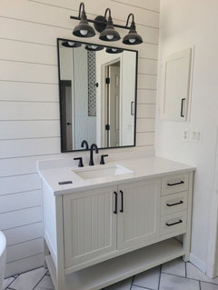 Mirror options for an outlet in the center of wall above vanity