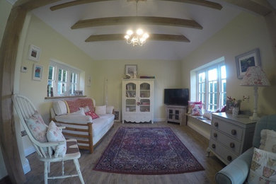 Example of a mid-sized classic formal and open concept porcelain tile and multicolored floor living room design in Surrey with beige walls and no tv