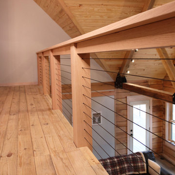 Black and Stainless Cable Railing on Loft of Log Home