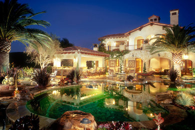 Island style pool photo in Orange County