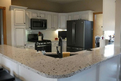 Kitchen after new Silestone Quartz Tops, Ge Slate appliances, Tile Backsplash an