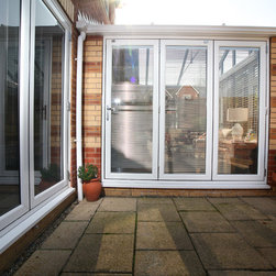 White Conservatory with PVCu Bi-Fold Doors - Products