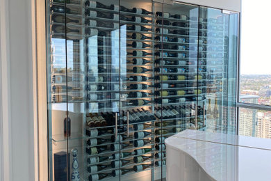 Wine cellar - modern wine cellar idea in Toronto