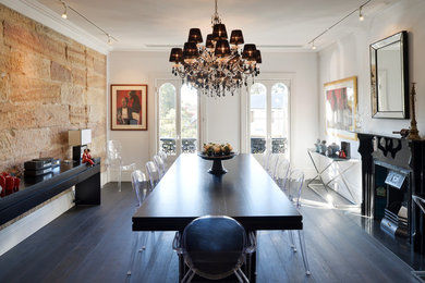 Inspiration for a mid-sized traditional kitchen/dining combo in Sydney with white walls and dark hardwood floors.