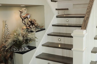 Beach style staircase photo in Other