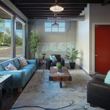 Modern Lounge with Natural Lighting and Stylish Furniture in a Contemporary Offi