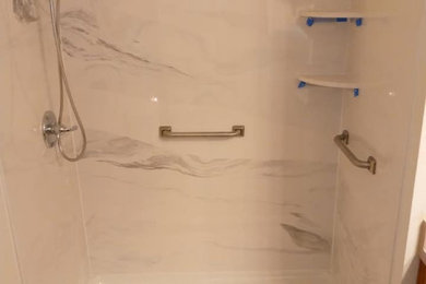 Example of a 3/4 white tile and marble tile doorless shower design in Dallas