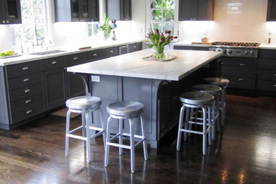 Large elegant u-shaped open concept kitchen photo in Los Angeles with an island, a farmhouse sink, beaded inset cabinets, gray cabinets, marble countertops, white backsplash, subway tile backsplash and stainless steel appliances