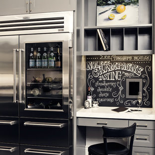 Design ideas for a small traditional study room in San Francisco with grey walls, slate floors and a built-in desk.