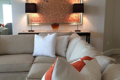 Example of a large transitional formal and open concept light wood floor living room design in Tampa with no tv