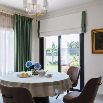 Neoclassical Dining Room with Emerald Green Curtains in Limassol