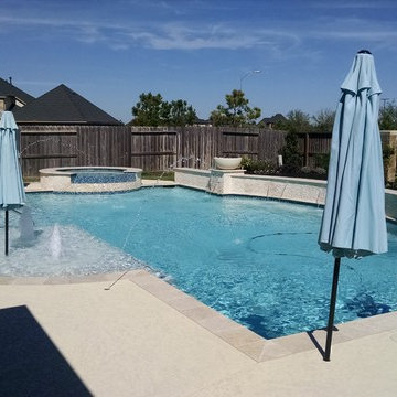 Geometric Pools with Raised Beam Water Feature Wall