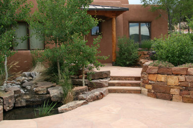Inspiration for a large southwestern full sun front yard landscaping in Albuquerque.