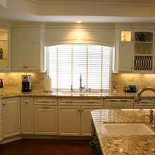 white cabinets dark island