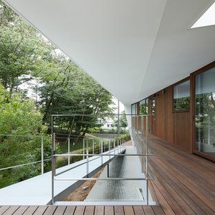他の地域のコンテンポラリースタイルのおしゃれなデッキ (張り出し屋根) の写真