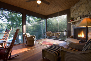 Mid-sized transitional back porch photo in Other with decking, a fire pit and a roof extension