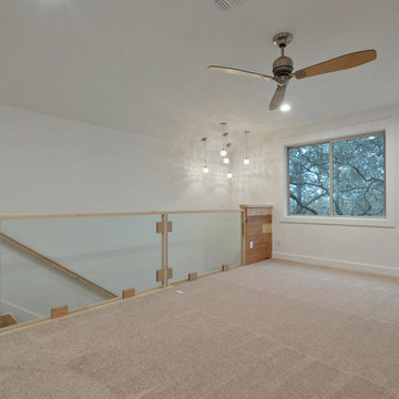 Austin Mid Mod Residence - Wide Plank Hand Scraped Natural Hickory