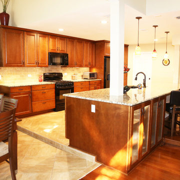 Traditional Kitchen with Dark Wood Finish and Functional Island