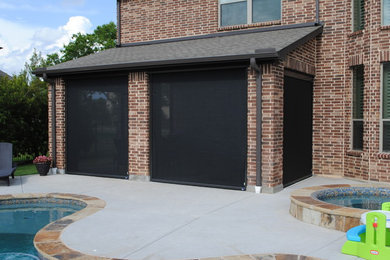 Example of a mid-sized trendy home design design in Dallas