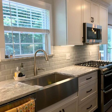 White Kitchen with Grey Marble counter-tops