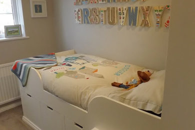 Small modern children’s room for boys in Dorset with grey walls and carpet.