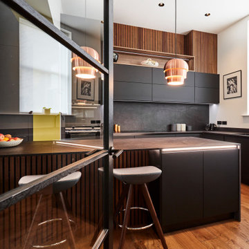 Kuhlmann Black handleless Kitchen with wooden Slat detail